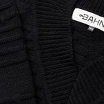 closeup of knitting details for Claire BAHNS wool sweater in black