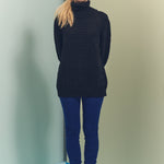model wearing wool sweater turtleneck from BAHNS