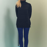 model wearing wool sweater turtleneck from BAHNS