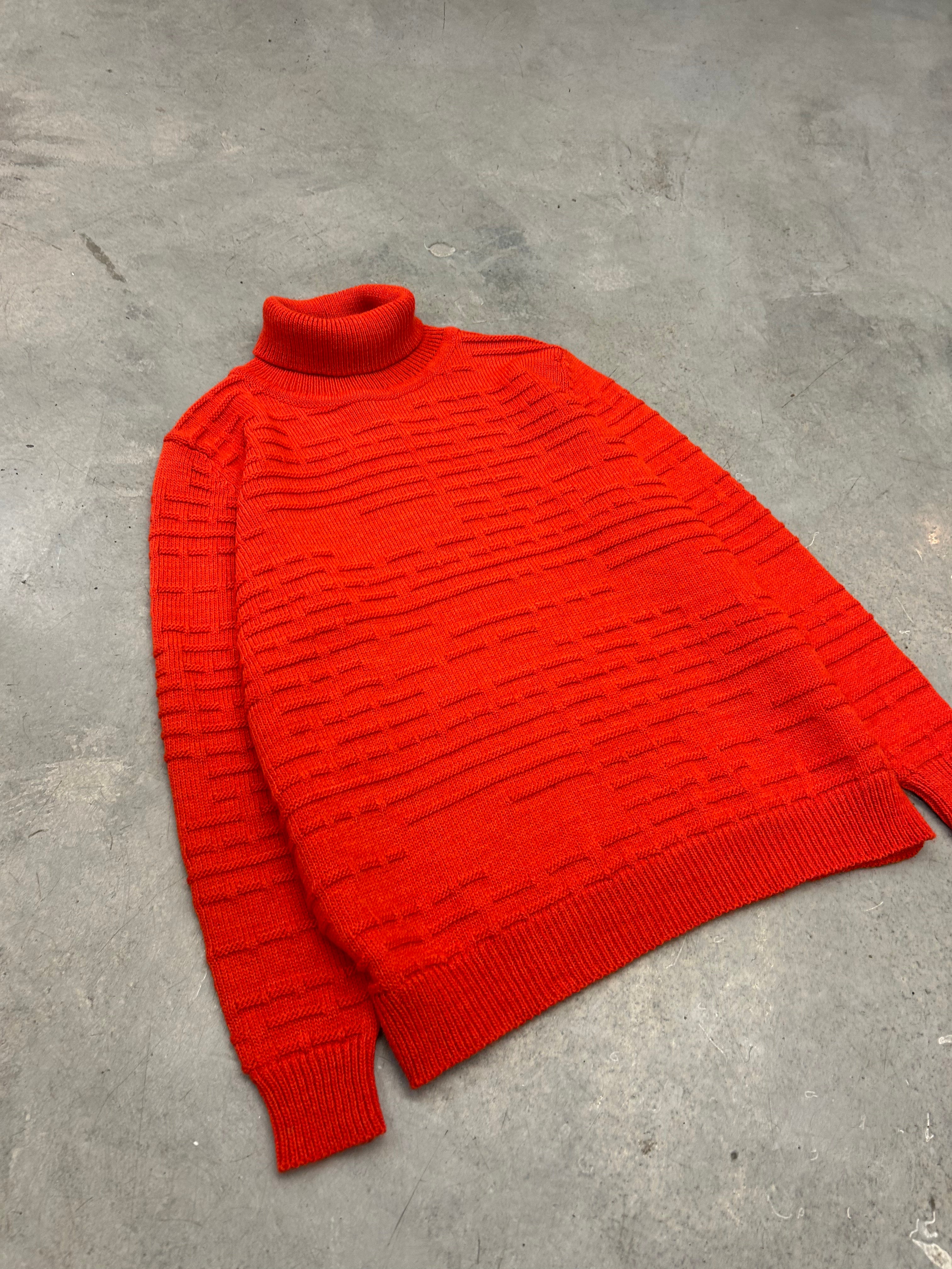 Orange turtleneck wool sweater in oversized fit