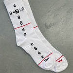 A pair of white sport socks from BAHNS by helicopter